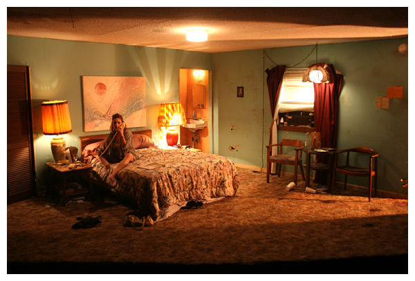 The motel room with Kate DeBuys (photo: Capital T Theatre)