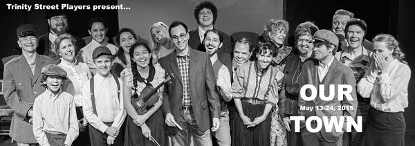 Scot Friedman surrounded by the cast (photo: Trinity Street Players)